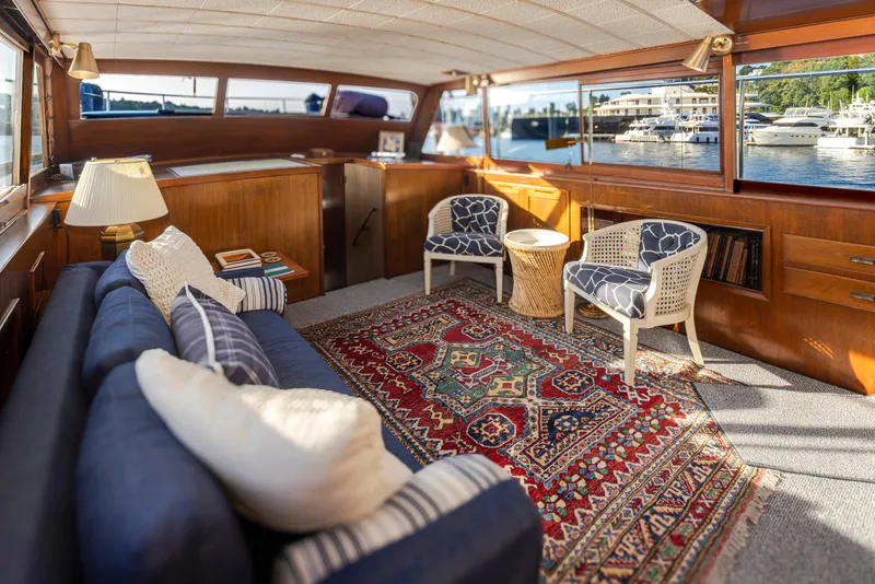 Slide: The Image of Interior of a 1965 Stephens Flushdeck yacht with cozy furnishings. - 23