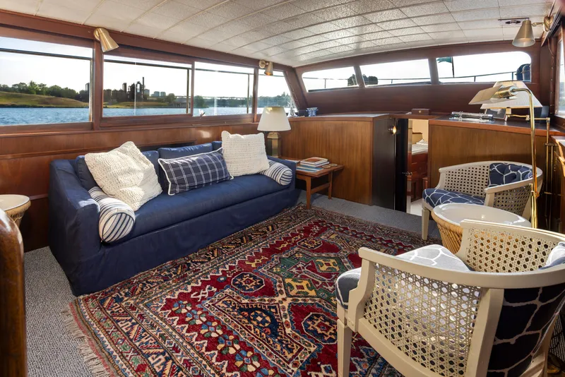 Slide: The Image of Interior of a 1965 Stephens Flushdeck yacht with cozy furnishings. - 24