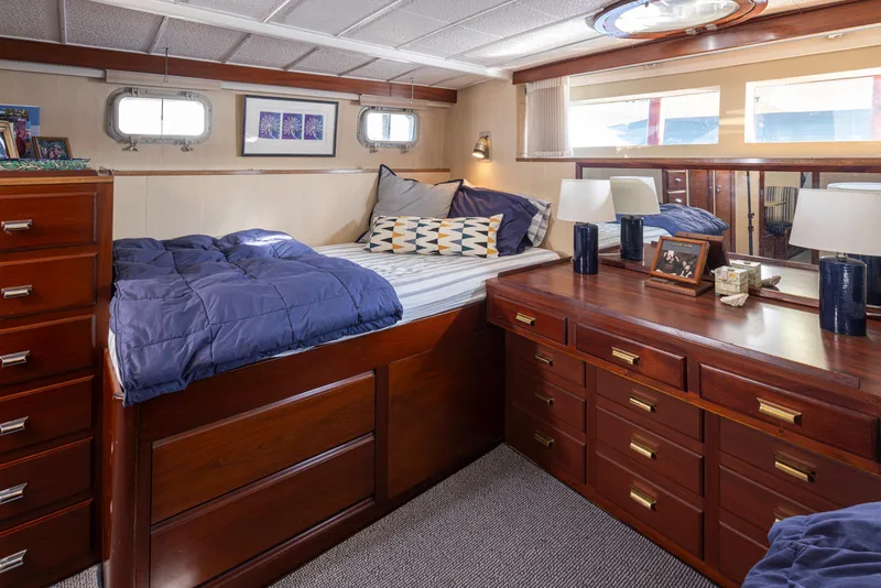 Slide: The Image of Interior of a 1965 Stephens Flushdeck yacht with wooden furnishings. - 28