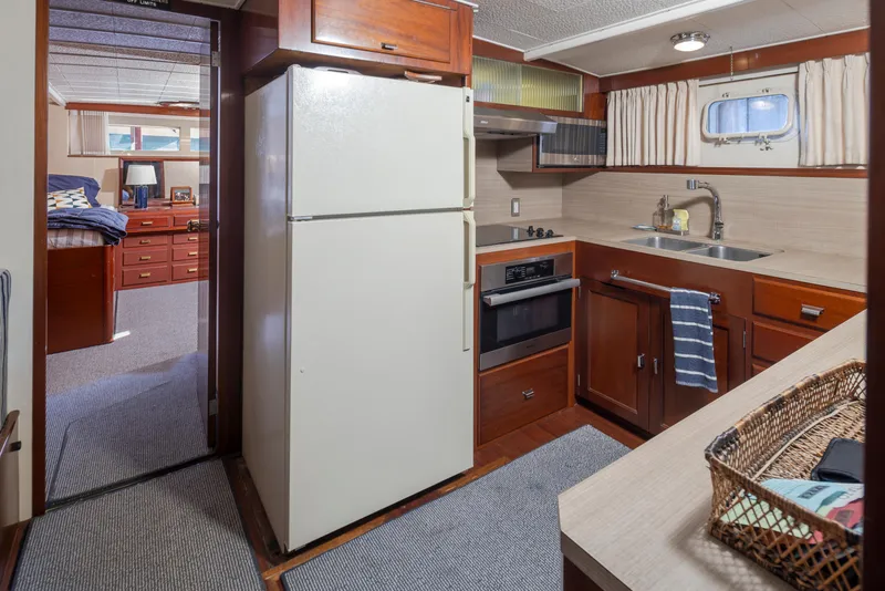 Slide: The Image of Interior view of a 1965 Stephens Flushdeck yacht kitchen. - 34