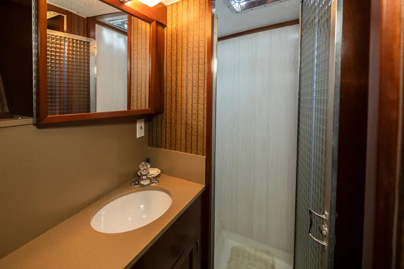 Slide: The Image of Bathroom in 1965 Stephens Flushdeck with shower and sink. - 40