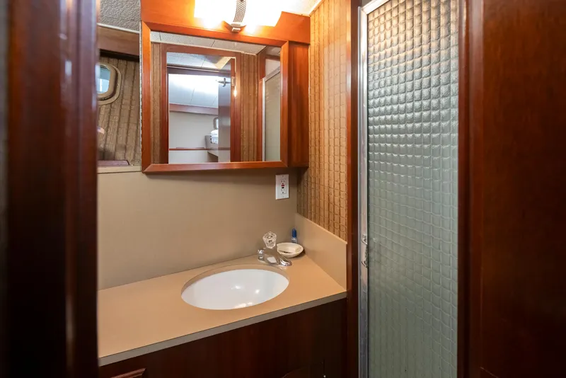 Slide: The Image of Bathroom in 1965 Stephens Flushdeck boat with mirror and shower. - 41