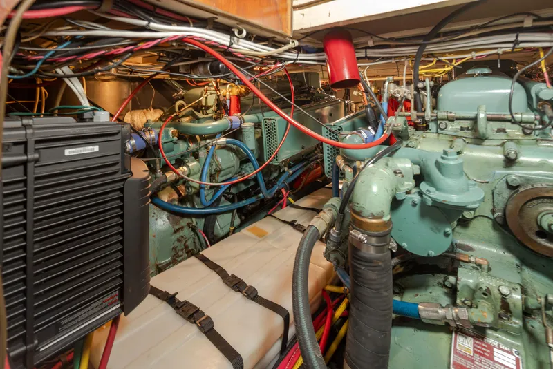 Slide: The Image of Engine room of a 1965 Stephens Flushdeck with complex wiring. - 42