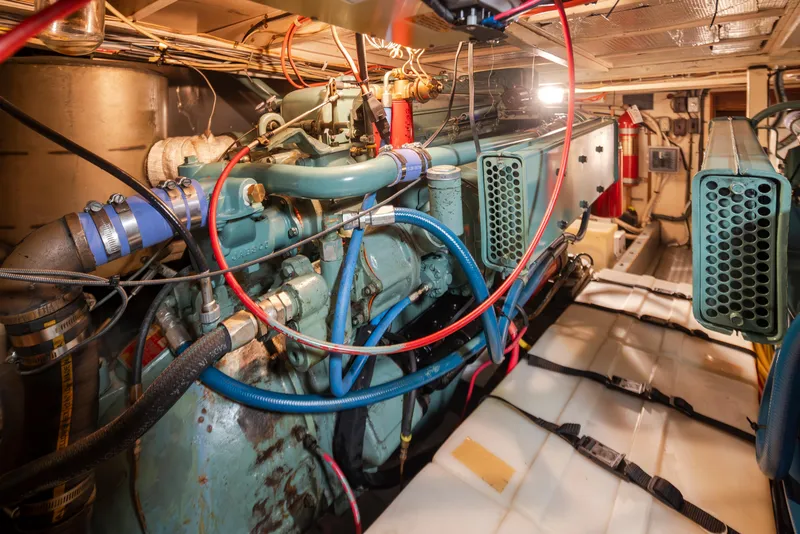 Slide: The Image of Engine room of a 1965 Stephens Flushdeck boat with complex wiring. - 44