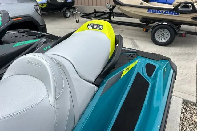 Slide: The Image of 2026 Sea-Doo GTI jet ski with gray seat and blue hull. - 10