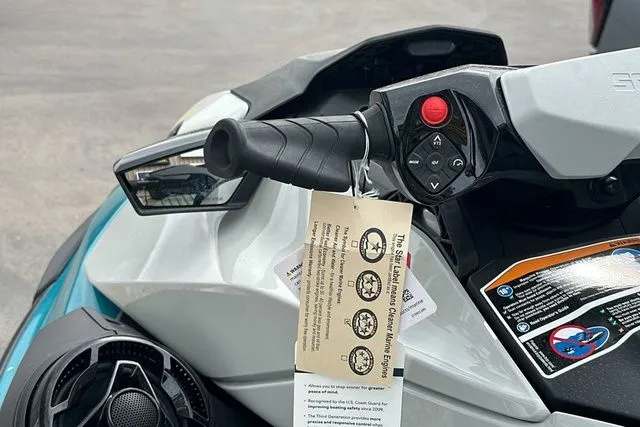 Slide: The Image of Close-up of 2026 Sea-Doo GTI handlebar with controls. - 31