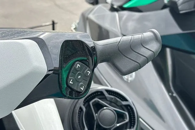 Slide: The Image of Close-up of Sea-Doo GTI 2026 handlebar grip with control buttons. - 33