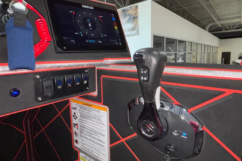 Slide: The Image of Control panel of 2026 Anthem Assault VF23 with Simrad display and throttle lever. - 15