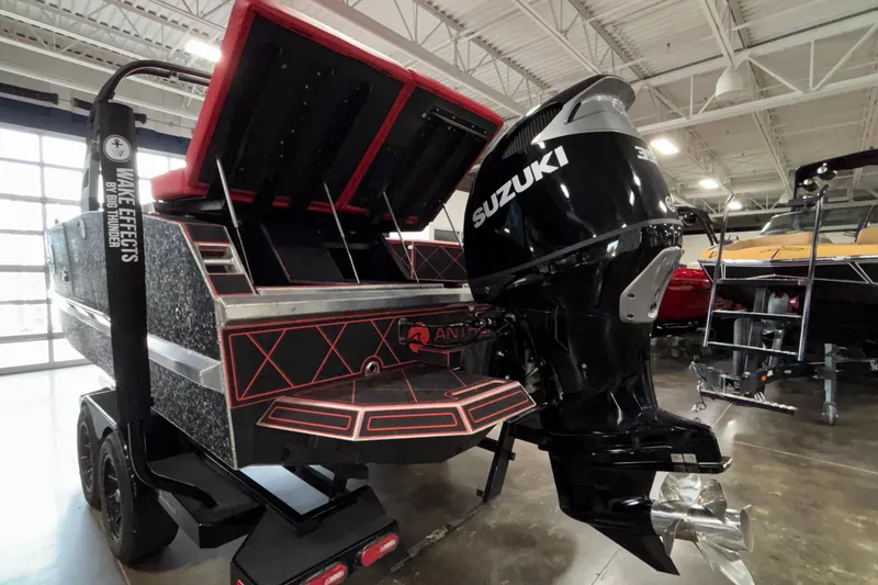 Slide: The Image of 2026 Anthem Assault VF23 boat with Suzuki outboard motor in showroom. - 21