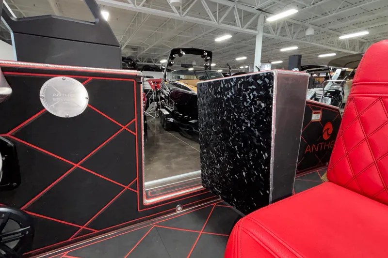 Slide: The Image of Interior of 2026 Anthem Assault VF23 with red and black design elements. - 25