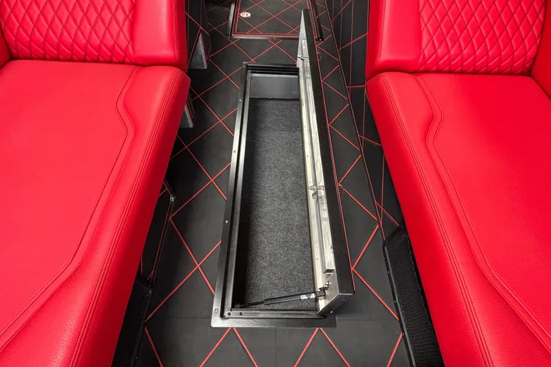 Slide: The Image of Red leather interior of 2026 Anthem Assault VF23 with open floor compartment. - 29