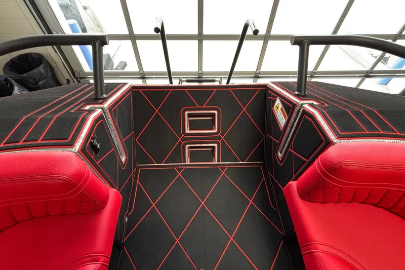 Slide: The Image of Interior of 2026 Anthem Assault VF23 with red and black seating design. - 30