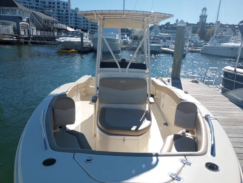 Slide: The Image of Scout 215 XSF 2022 boat docked in marina, sunny day. - 18