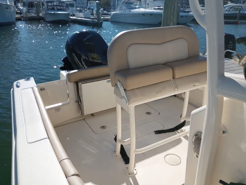 Slide: The Image of 2022 Scout 215 XSF boat interior at marina. - 19