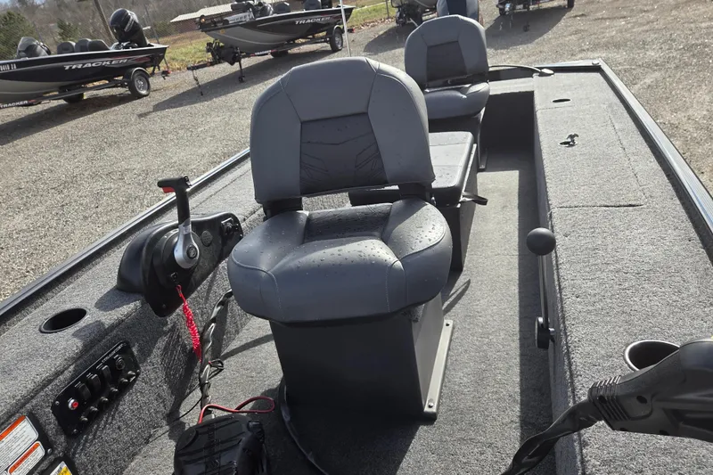 Slide: The Image of 2025 Tracker Panfish 17 boat interior with seating and control panel. - 10