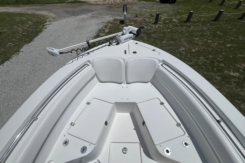 Slide: The Image of 2014 Sea Fox 226 Commander boat bow with seating and storage compartments. - 11