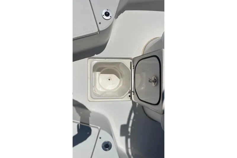 Slide: The Image of 2014 Sea Fox 226 Commander boat storage compartment and hatch detail. - 15