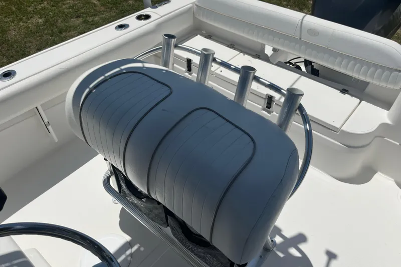 Slide: The Image of 2014 Sea Fox 226 Commander boat interior with seating and rod holders. - 21