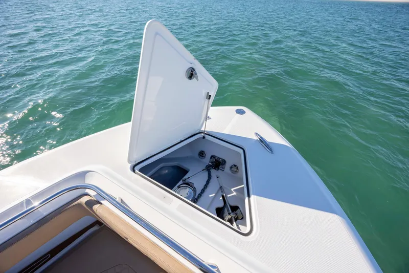 Slide: The Image of Open anchor hatch on 2020 Blackwater 41 Tournament boat in calm waters. - 16