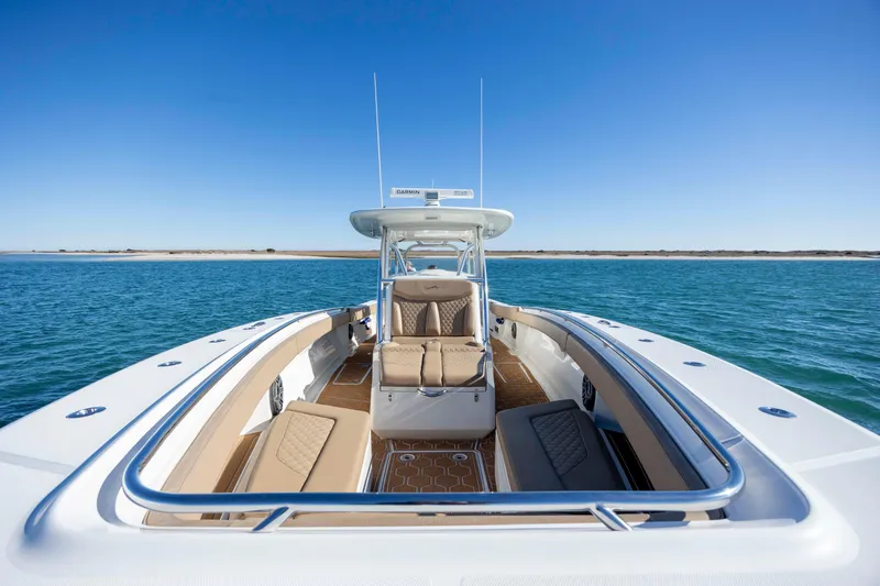 Slide: The Image of 2020 Blackwater 41 Tournament boat on open water, featuring spacious seating and sleek design. - 18