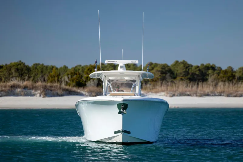 Slide: The Image of Front view of a 2020 Blackwater 41 Tournament boat on calm water. - 2