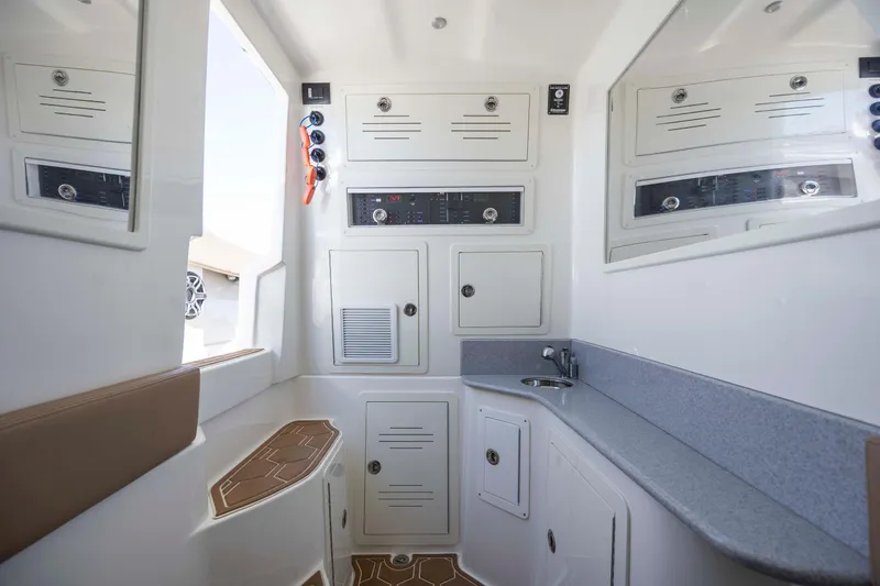 Slide: The Image of Interior of 2020 Blackwater 41 Tournament boat with cabinets and sink. - 25