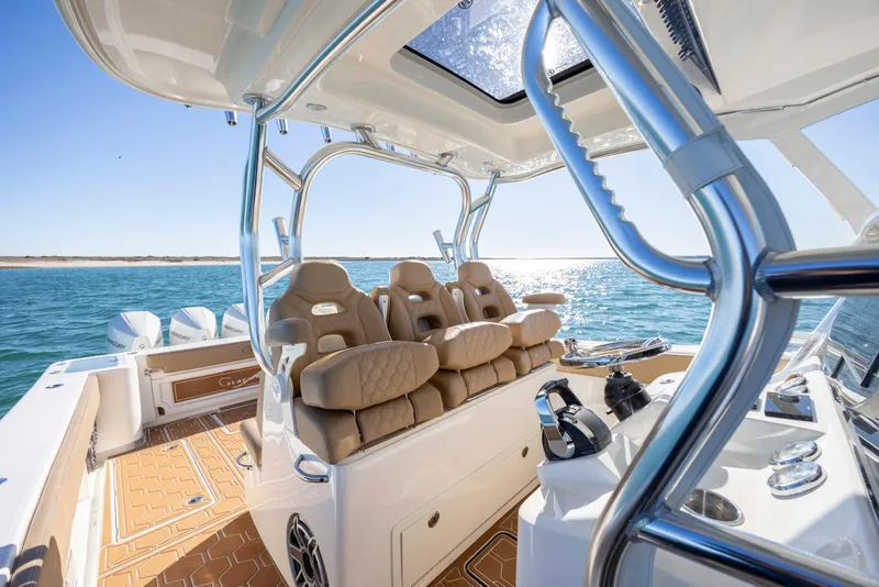 Slide: The Image of Luxurious 2020 Blackwater 41 Tournament boat interior with plush seating and ocean view. - 29