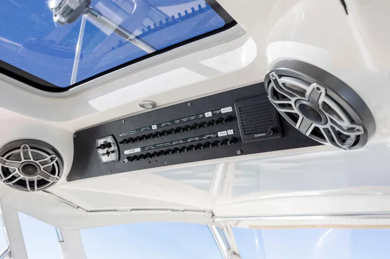 Slide: The Image of Control panel and speakers on 2020 Blackwater 41 Tournament boat ceiling. - 35