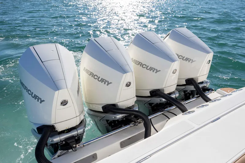 Slide: The Image of Four Mercury outboard engines on a 2020 Blackwater 41 Tournament boat in the ocean. - 51