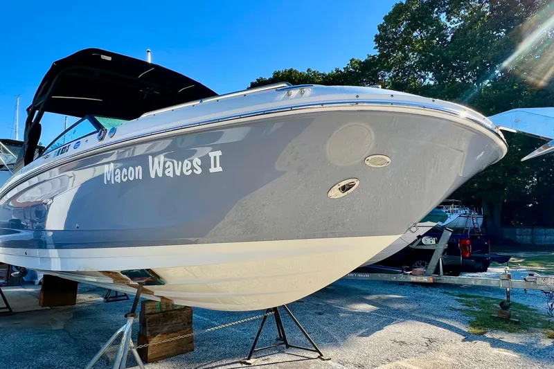 The Image of 2018 Sea Ray 290 Sundeck Outboard boat named "Macon Waves II" on display outdoors. - 1
