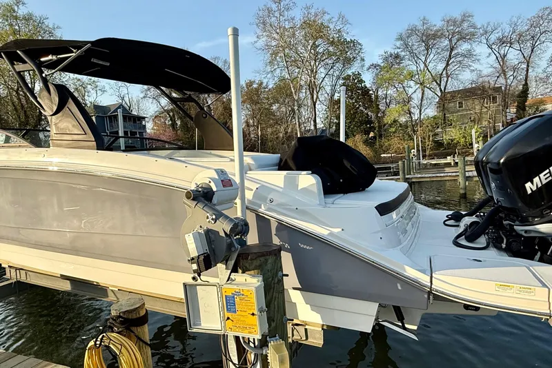 Slide: The Image of 2018 Sea Ray 290 Sundeck Outboard docked, featuring sleek design and powerful Mercury engine. - 6