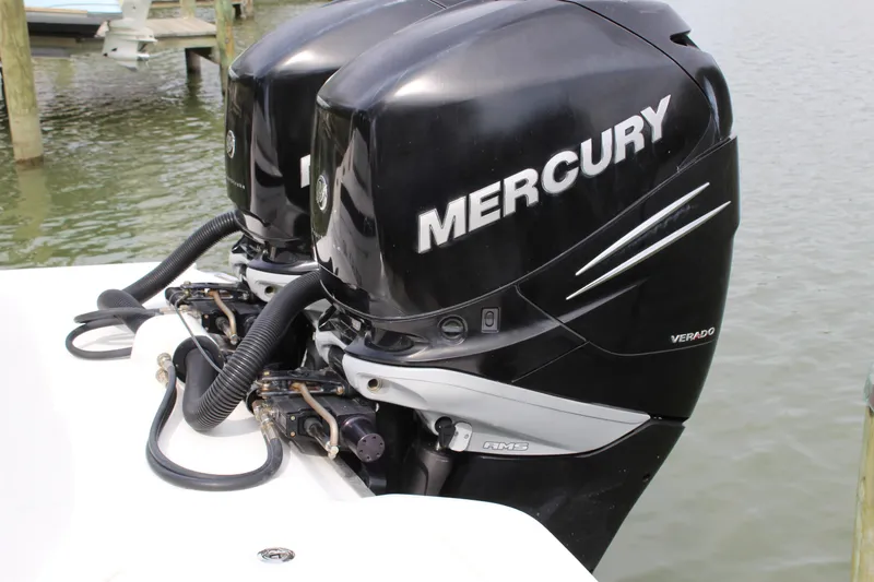 Slide: The Image of 2018 Sea Ray SDX 290 with Mercury outboard engines at the dock. - 13