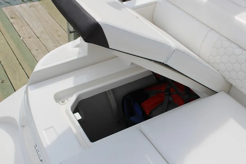 Slide: The Image of Storage compartment in 2018 Sea Ray SDX 290 Outboard boat. - 18
