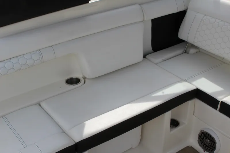 Slide: The Image of Interior of 2018 Sea Ray SDX 290 Outboard with white upholstery. - 28