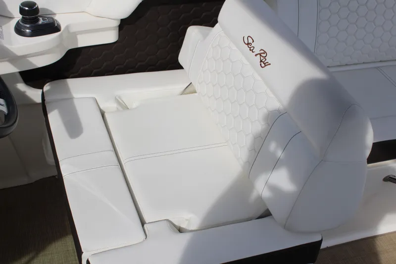Slide: The Image of Interior of 2018 Sea Ray SDX 290 Outboard with white seating. - 31
