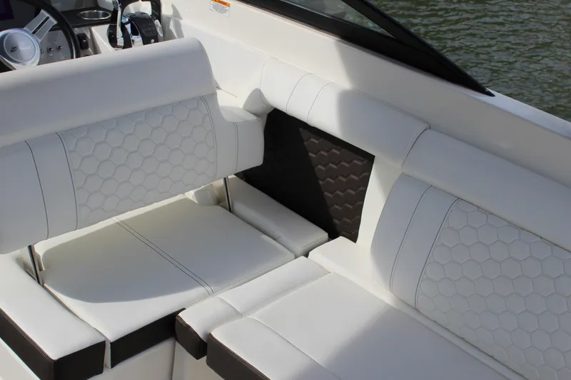 Slide: The Image of Interior of 2018 Sea Ray SDX 290 Outboard with white upholstery. - 32