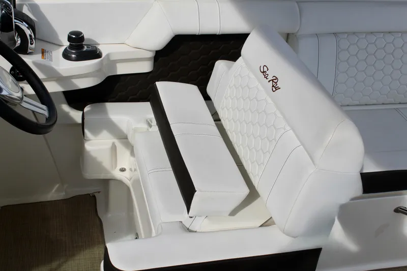 Slide: The Image of Interior of 2018 Sea Ray SDX 290 Outboard with white upholstery. - 33