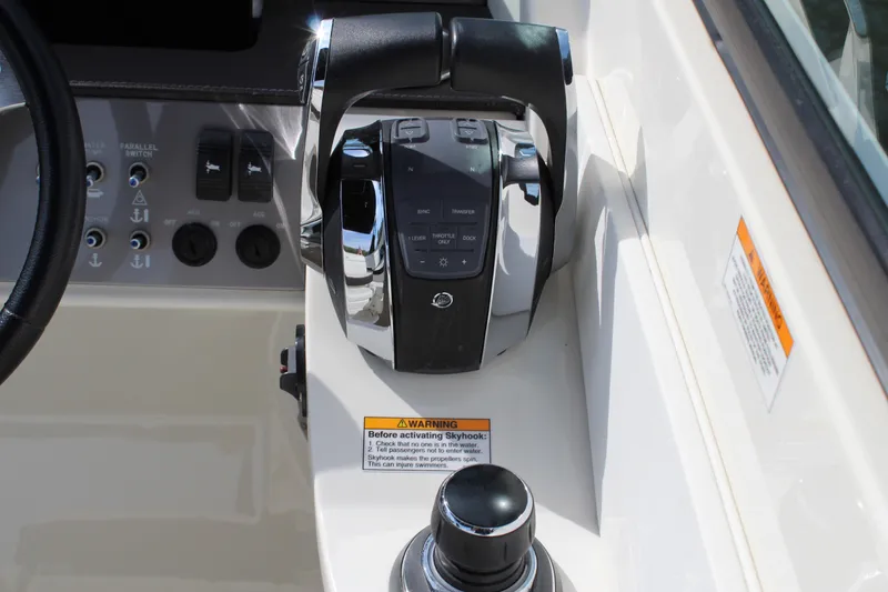 Slide: The Image of Control console of 2018 Sea Ray SDX 290 Outboard with controls. - 36