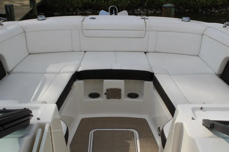 Slide: The Image of Interior of 2018 Sea Ray SDX 290 Outboard with white seating. - 39