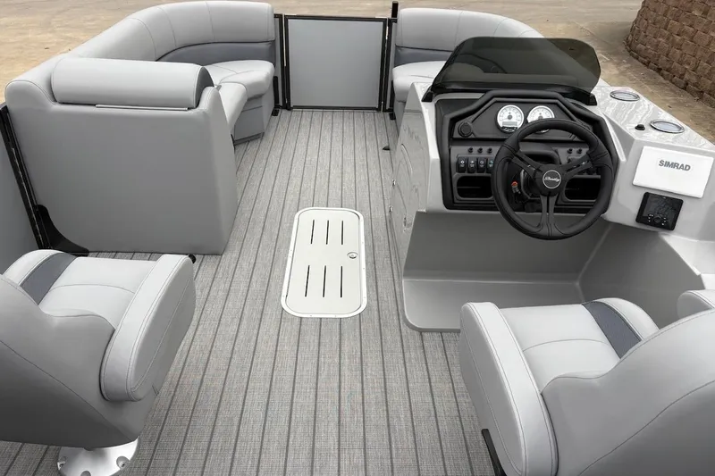 Slide: The Image of 2026 Bentley Pontoons Legacy 223 Navigator interior with modern helm and seating. - 8