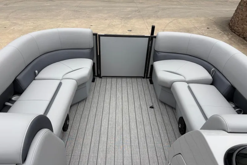 Slide: The Image of 2026 Bentley Pontoons Legacy 223 Navigator interior with sleek gray seating and flooring. - 9