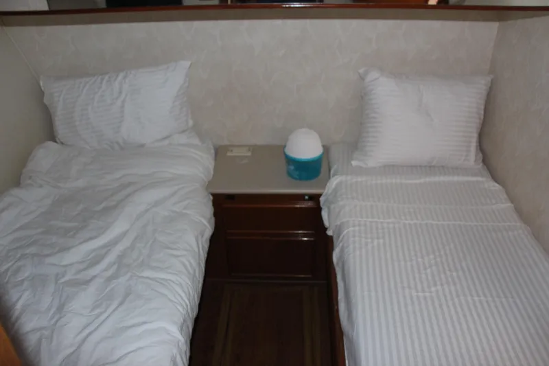 Slide: The Image of Twin beds in a cozy cabin, Post 50 yacht, year 2000. - 15