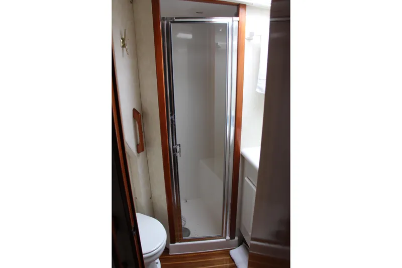 Slide: The Image of Compact bathroom with shower in 2000 Post 50 model yacht. - 16