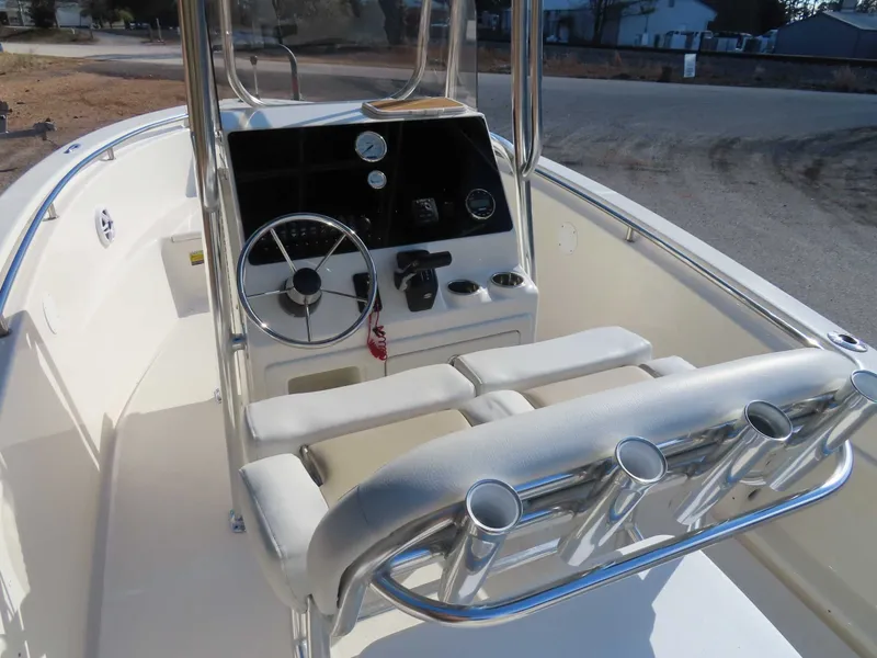 Slide: The Image of Interior view of a 2025 Bulls Bay 230 CC boat with helm console. - 14