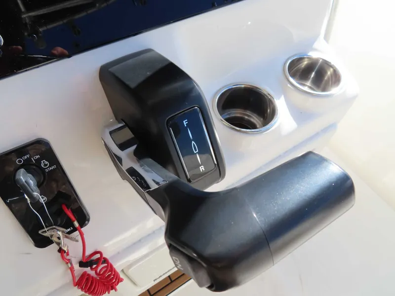 Slide: The Image of Bulls Bay 230 CC boat controls with Suzuki 250 engine, year 2025. - 21