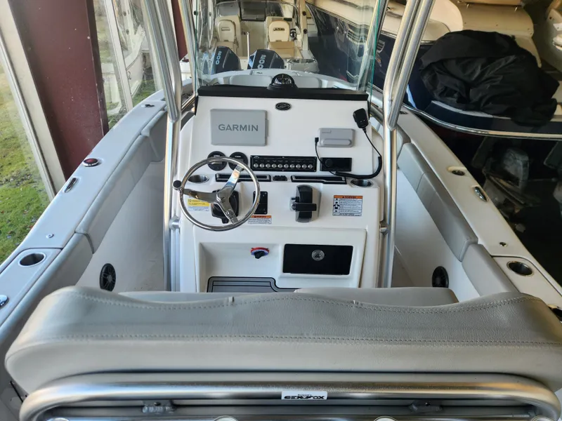 Slide: The Image of Interior view of 2023 Sea Fox 248 Commander with Garmin controls. - 16