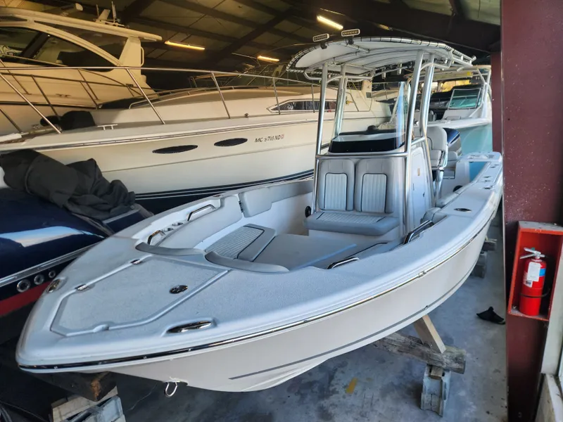 Slide: The Image of 2023 Sea Fox 248 Commander boat in storage facility. - 2