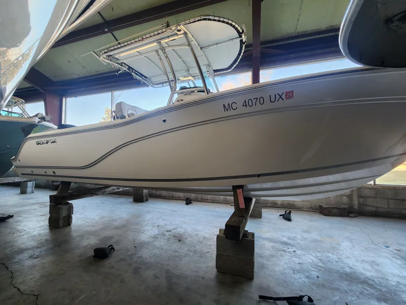 Slide: The Image of 2023 Sea Fox 248 Commander boat in storage facility. - 5