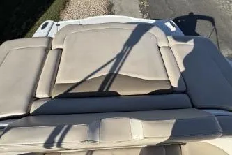 Slide: The Image of Interior of 2011 Chaparral 246 SSi boat with beige seating and modern design. - 5