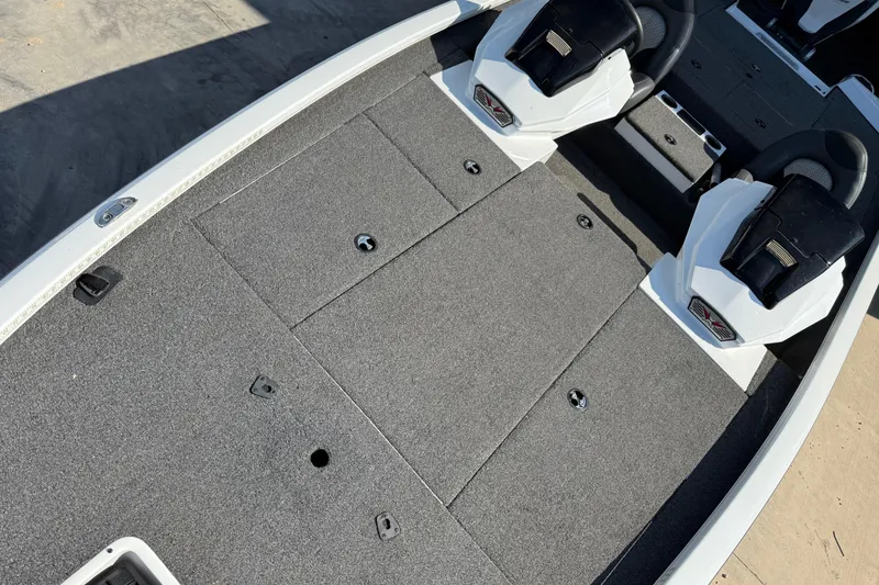 Slide: The Image of 2020 Vexus AVX 2080 boat interior with gray carpet and dual seats. - 25